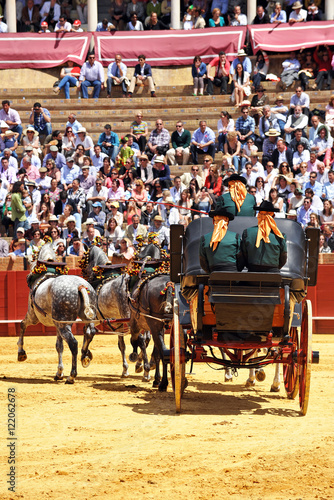 Exhibition of horse carriages in the bullring in Seville, Spain
