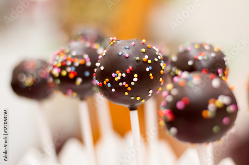 Delicious chocolate cake pops with sprinkles - sweet food