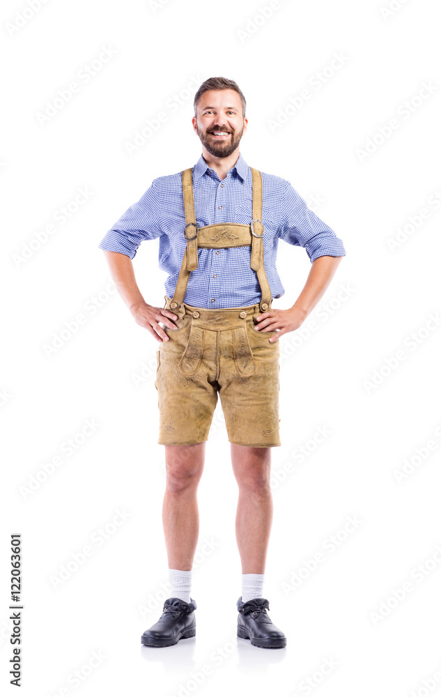 Man in traditional bavarian clothes, hands on hips Man in traditional bavarian clothes, hands on hips
