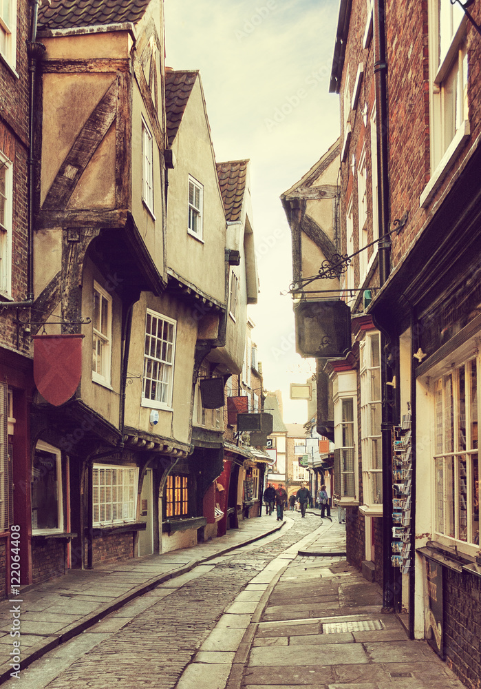 The Shambles, a medieval street in York, England, UK.  Toned image. Added grunge texture