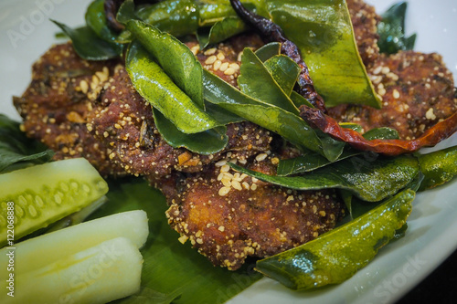 Fried pork with kaffir leaf.