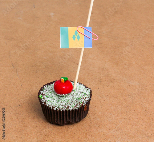 st. vincent and the grenadines flag, Apple Cupcake with red apple shape bonbon on the top photo