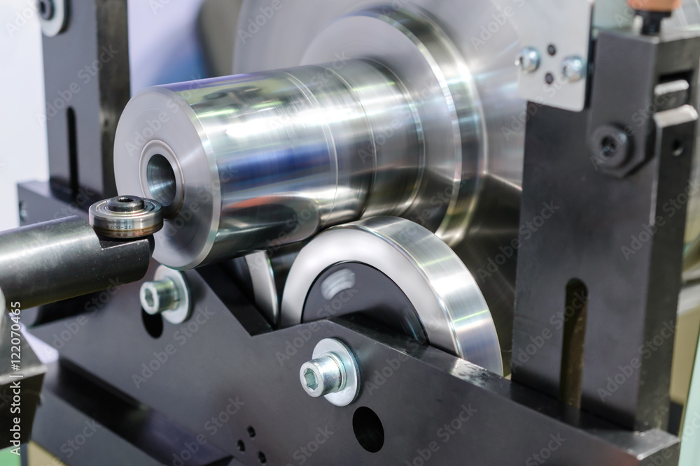 Thick metal shaft mounted on steel wheels. Thick metal shaft mounted on steel wheels.