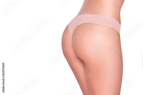 Fotografie Perfect buttocks - tanned naked body