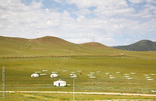  The ger camp in a large meadow at Ulaanbaatar , Mongolia
 photo