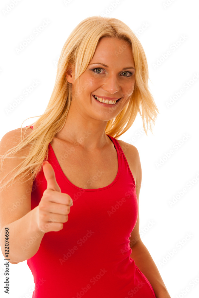 woamn in red summer dress showing thumb up as a sign for success woamn in red summer dress showing thumb up as a sign for success