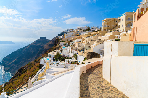 Path in Imerovigli village with typical Greek white architecture photo