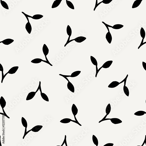 Floral seamless pattern in black on cream background.