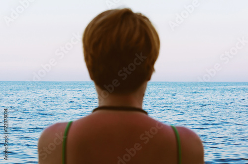 Woman on seashore photo