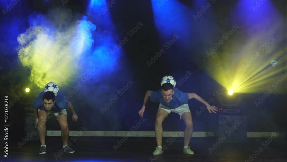 two boys juggling ball two boys juggling ball