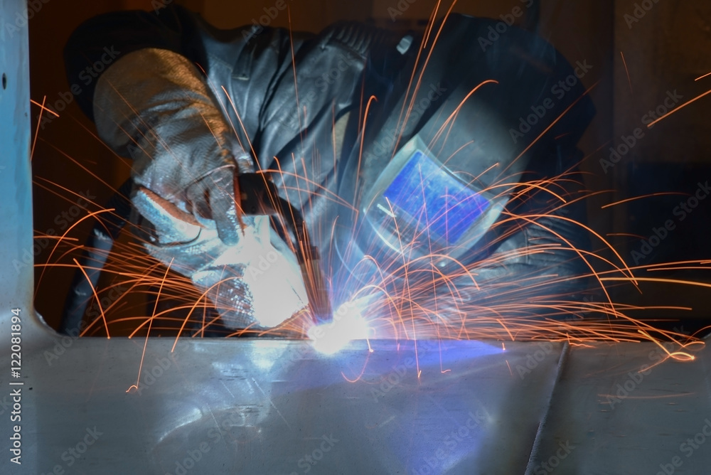 Industrial steel welder in factory Industrial steel welder in factory