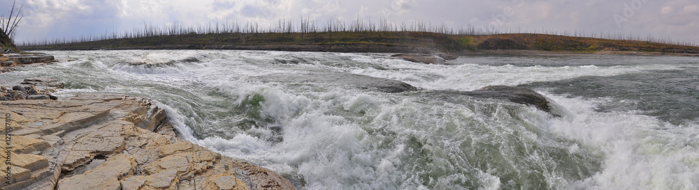Fototapeta premium Rocky rapids on a Northern river.