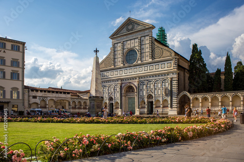 Santa Maria Novella in pink flowers in a summer day. Florence, Italy photo
