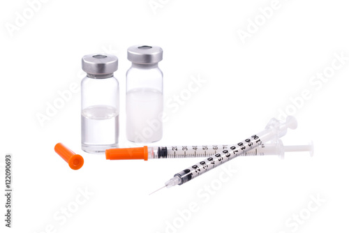 Fototapeta Naklejka Na Ścianę i Meble -  Syringes caps and bottles kits isolated on white background