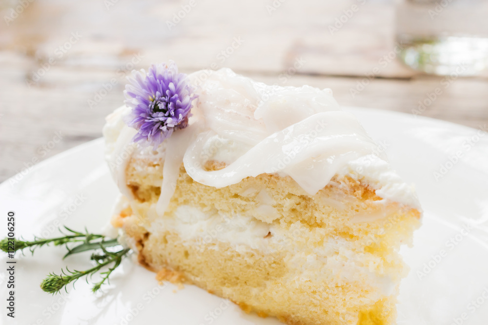 Coconut cake with young coconut on top Coconut cake with young coconut on top
