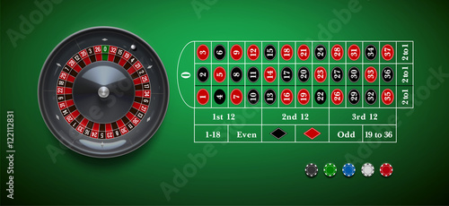 casino roulette wheel with  chips isolated on green  table reali