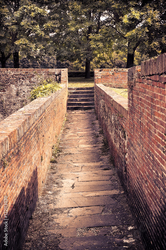 Passage into a bastion along the medieval walls of Lucca (Tuscany - Italy)