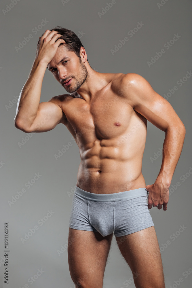 Fototapeta premium Attractive brutal man in underwear posing