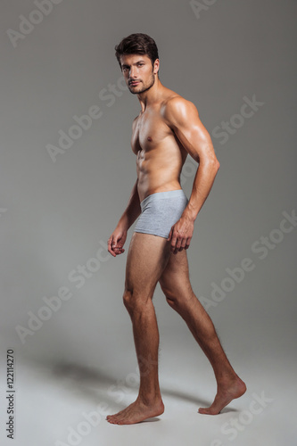 Portrait of a athletic man in underwear looking at camera