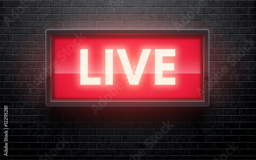 glowing live red sign isolated on black brick wall