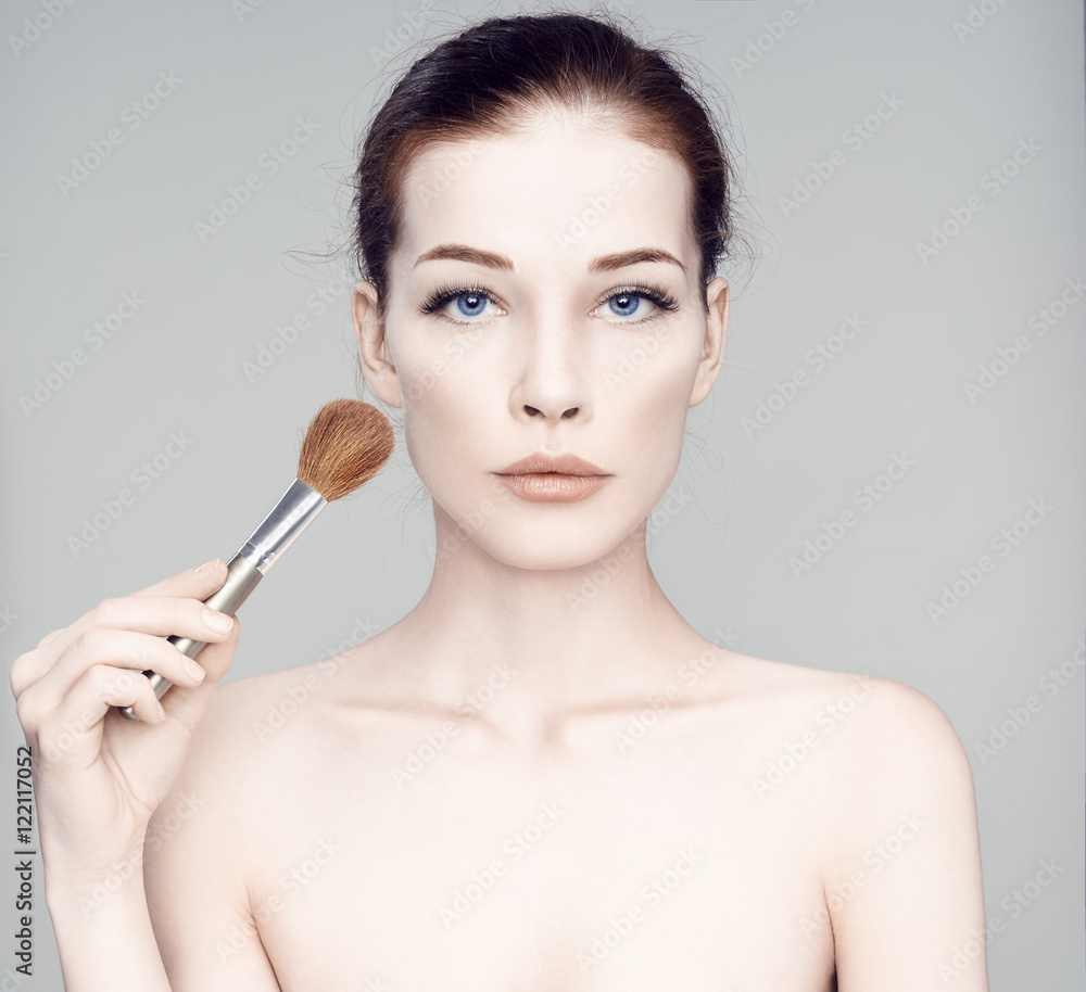 Fashion Beautiful woman face. Mascara Applying.Eyes Make-up. Bea