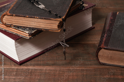 Fényképezés Ancient books and rosary Catholic (prayer beads)