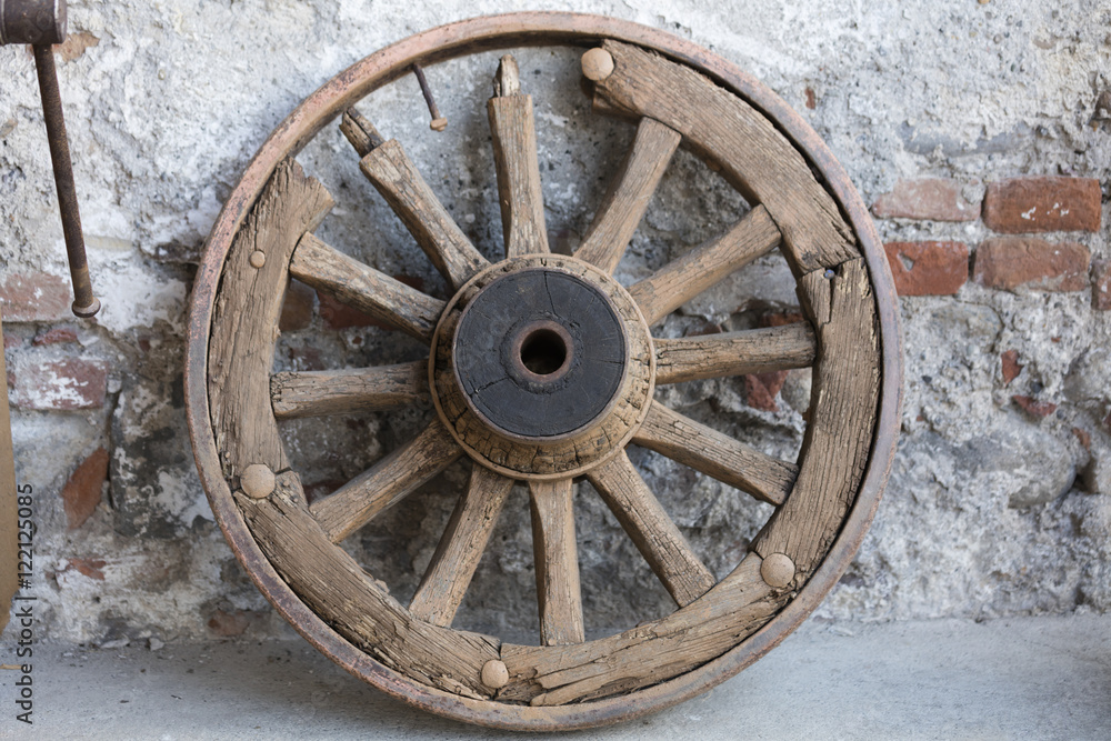 old wooden wheel in the farm