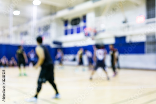 Abstract Blurred background image of basketball players in court