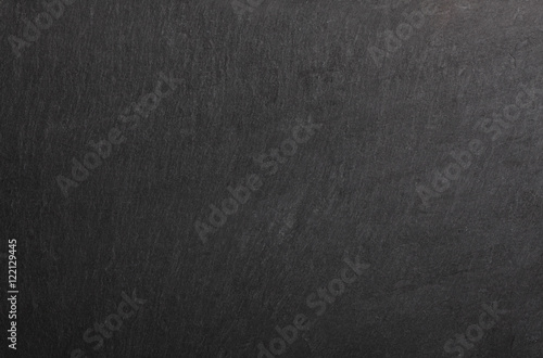 background of dark real natural slate stone