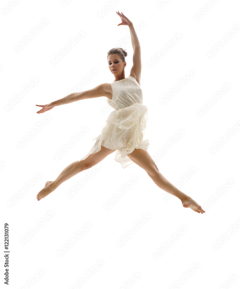 Beautiful ballerina posing in graceful leap