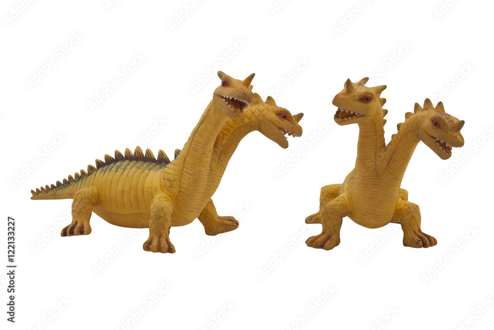 Obraz premium Dragon toy photo. Isolated two-headed dragon toy full face and angle view photo.