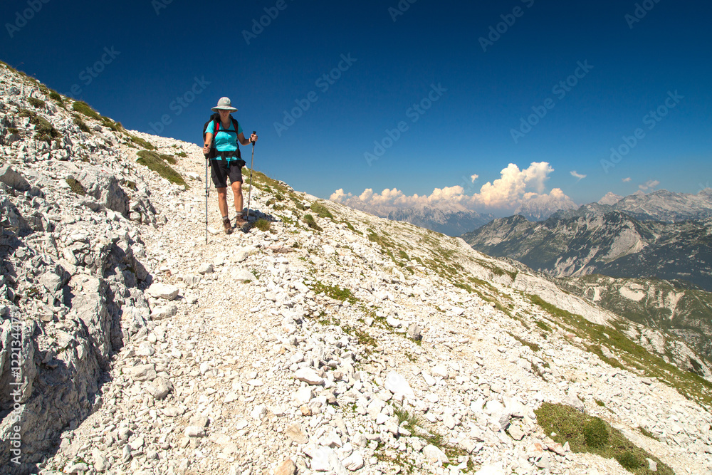 Mountaineer on the march to the mountain Peski, Krn, Julian Alps, Slovenia 