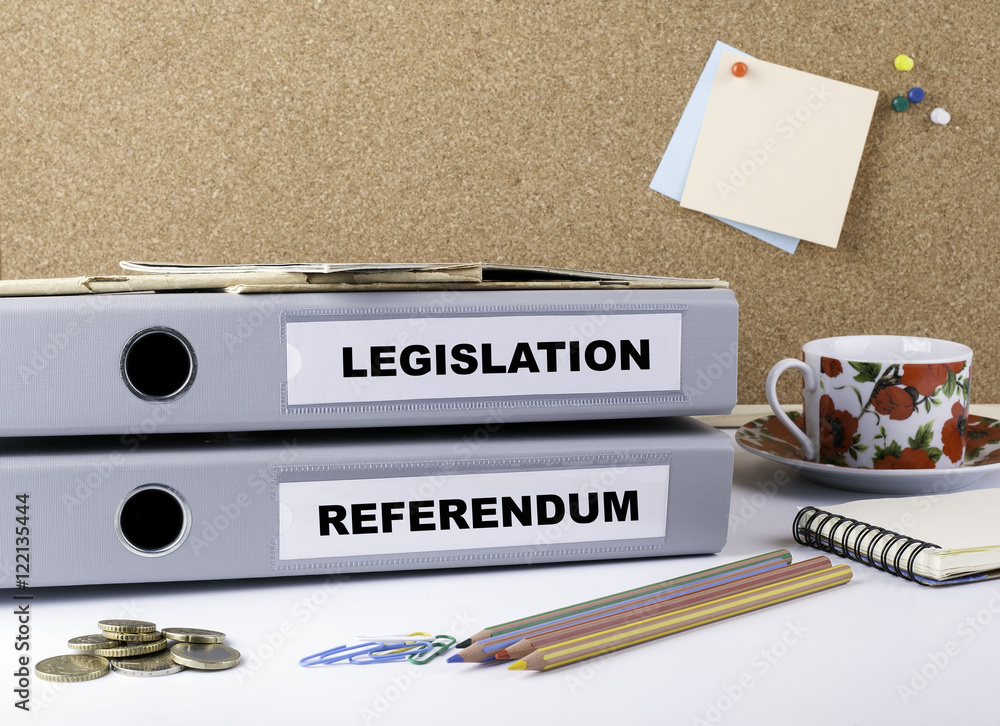 Legislation and Referendum two folders on white office desk. foto de
