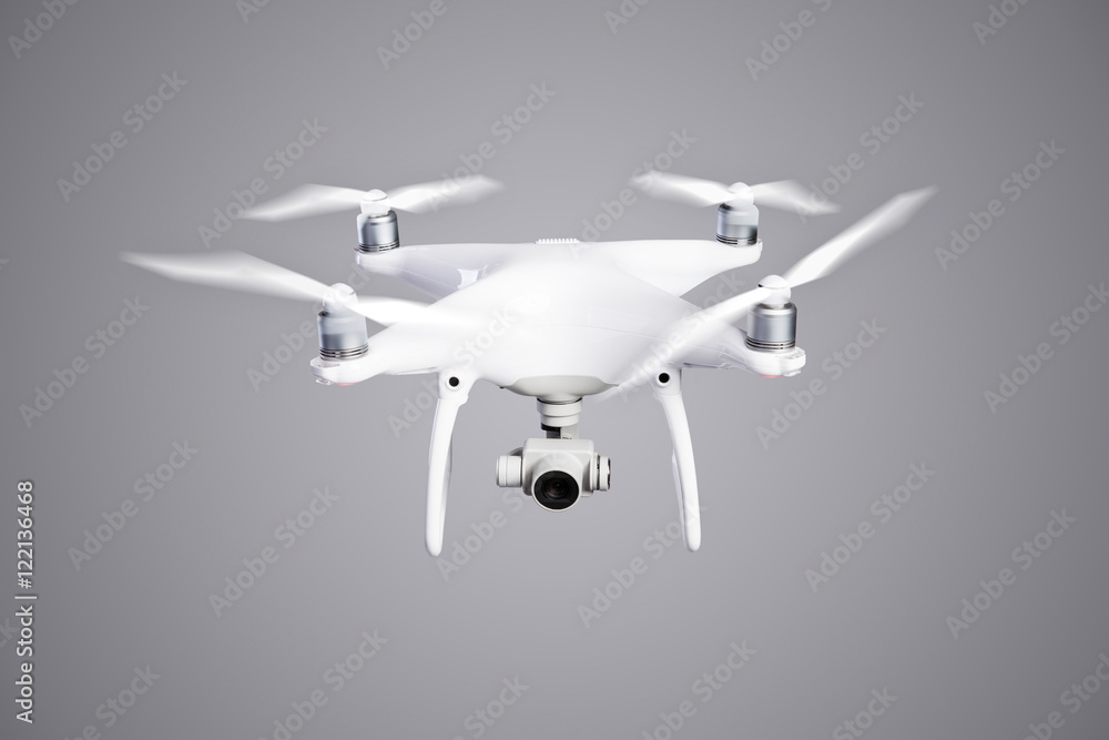 Flying helicopter drone with camera. Studio shot. Flying helicopter drone with camera. Studio shot.