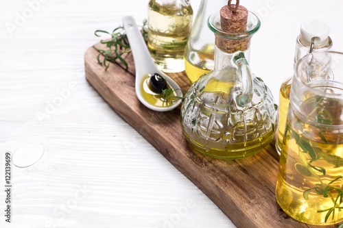 Fototapeta Naklejka Na Ścianę i Meble -  Oils on vintage wooden background . healthy food