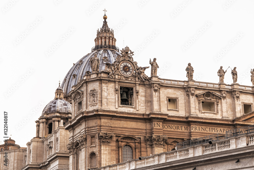 St. Peter's Basilica over white sky in Rome, Italy