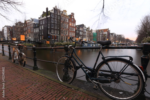 Bicycles on a bridge over the canals of Amsterdam, Netherlands
