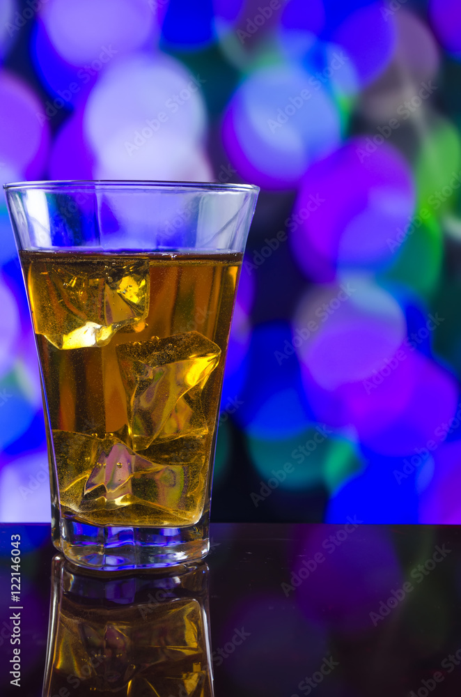 the refreshing juice with ice on a bright background the refreshing juice with ice on a bright background