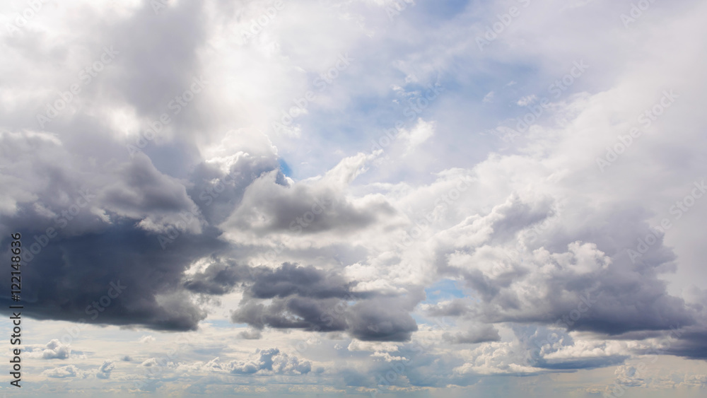 Beautiful summer day sky. Clear crisp cloudscape with large, building clouds, light rays and sun flare, perfect for digital composition background. Beautiful summer day sky. Clear crisp cloudscape with large, building clouds, light rays and sun flare, perfect for digital composition background.