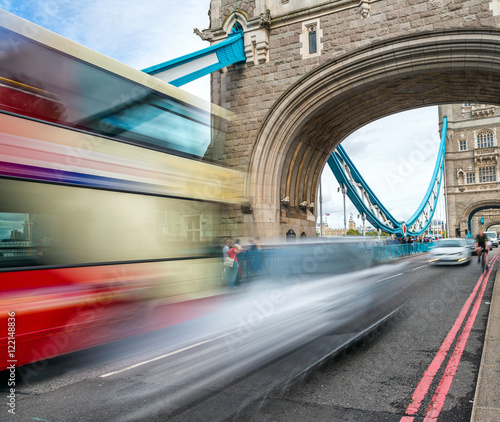 Blurred view of bus crossing Tower Bridge, London - UK