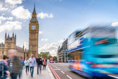 Photography Fast moving tourists and traffic along Westminster Bridge, Londo