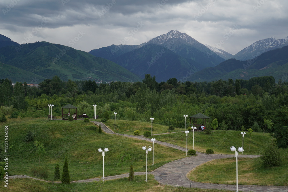 Fototapeta premium Mountains and cloudy sky