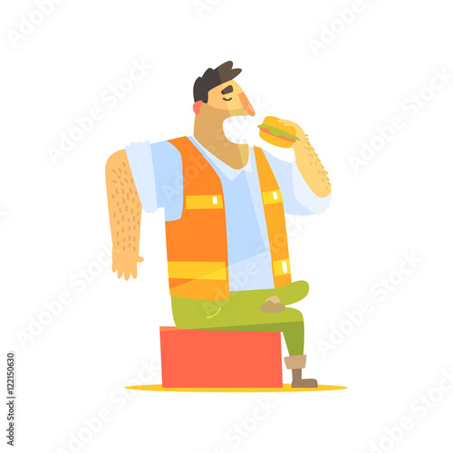 Builder Eating Lunch On Construction Site