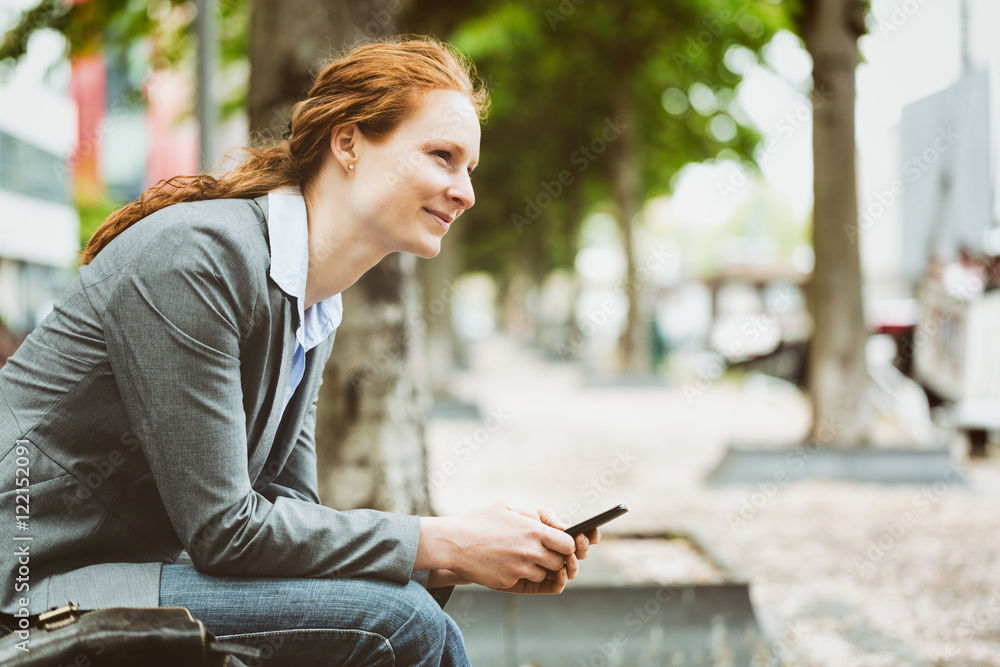 Young Entrepreneur with a Mobile Phone Young Entrepreneur with a Mobile Phone