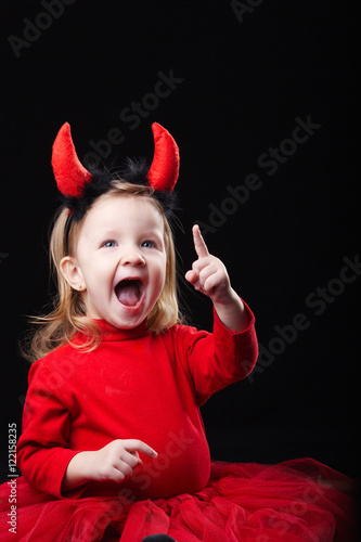 little devil on dark background