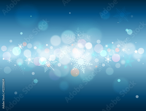 Glittering blue winter vector background with bokeh and snowflakes