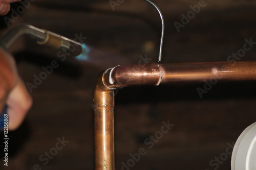 Fotografija soldering copper pipework