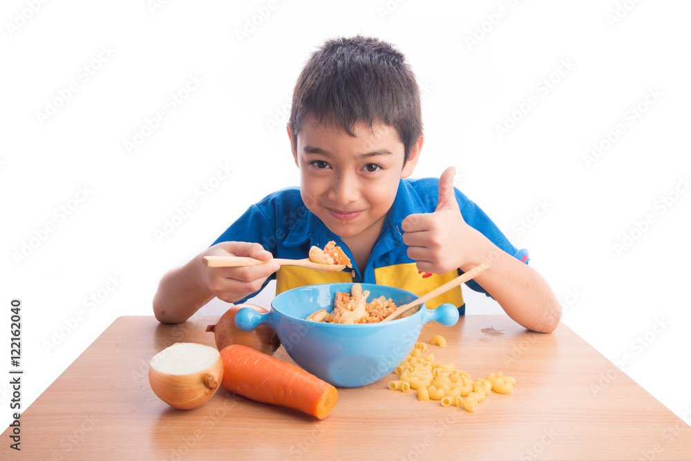 Little boy eating macaroni pasta healthy food Little boy eating macaroni pasta healthy food
