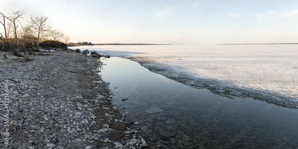 Shoreline of Frozen lake in winter, Lake Winnipeg, Hecla Grindst