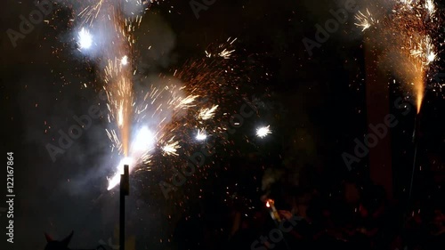 Fire Run (Correfoc) traditional celebration of Catalonia, devils dancing among people with fireworks in the hands to the beat of drums.